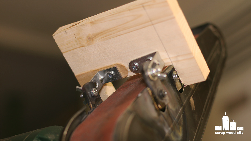 scrap wood city DIY tool rest for sharpening with the vertical belt sander