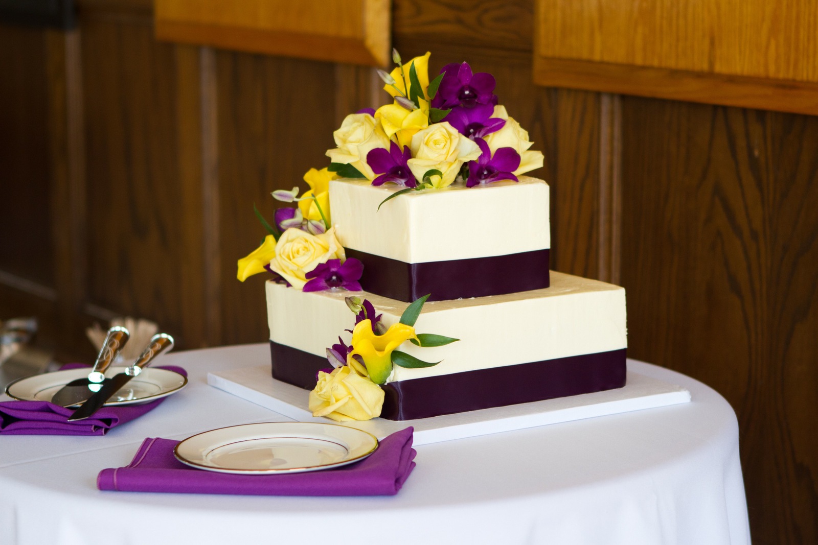 Square Two-Tier Wedding Cake by JCakes with Flowers by Lane & Lenge - Photo Courtesy of Brian Samuels Photography