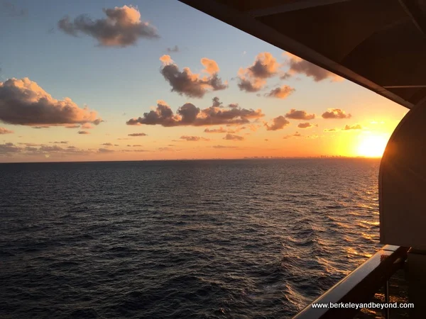 sunset view in the Bahamas from cabin verandah of Holland America Line’s Nieuw Amsterdam
