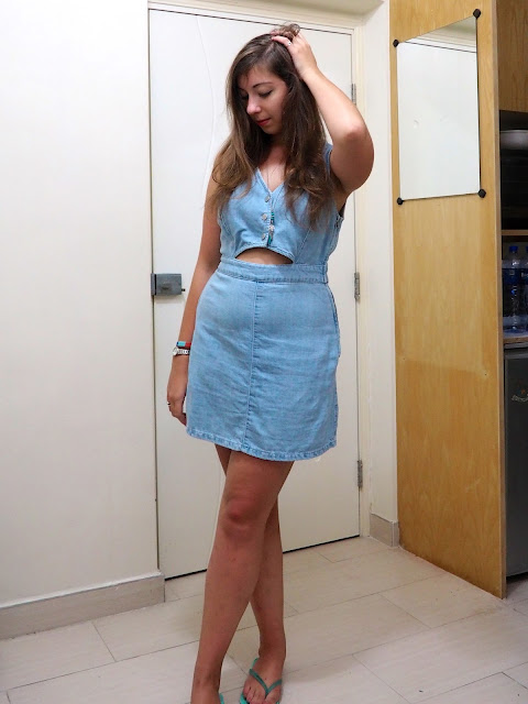 Dressing in Denim | light blue denim dress with cut out middle, with blue flip flops and silver pendant necklace