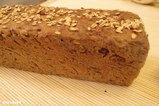 Bread fresh from the oven, decorated with oat flakes