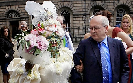 #: Guinness World Record for the most pierced woman in the world.