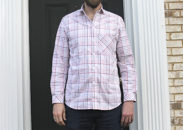 A pink and white plaid men's shirt made using the Thread Theory Fairfield Button-Up Shirt sewing pattern.