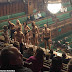 Semi-naked climate change protesters interrupt Commons debate on Brexit as they strip off in the public gallery and GLUE themselves to the glass protecting MPs