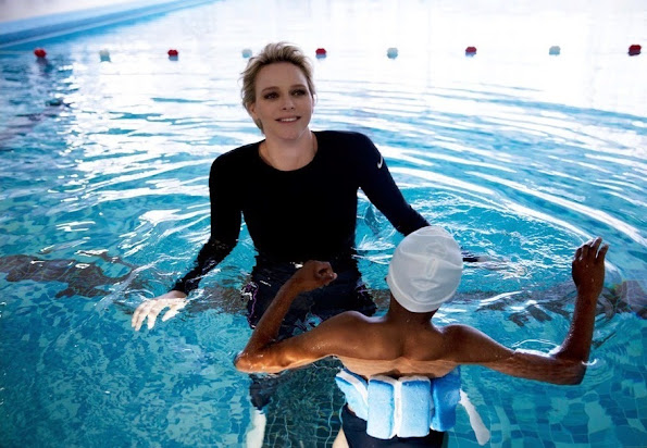 Princess Charlene of Monaco attended a activity supported from her founding at the St. Charles College's pool