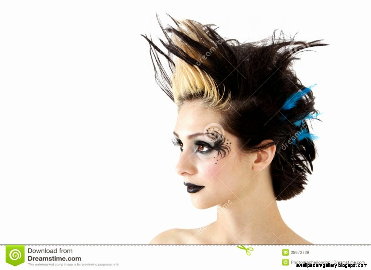 Close up Of Gothic Woman With Face Painting And Spiked Hair Over