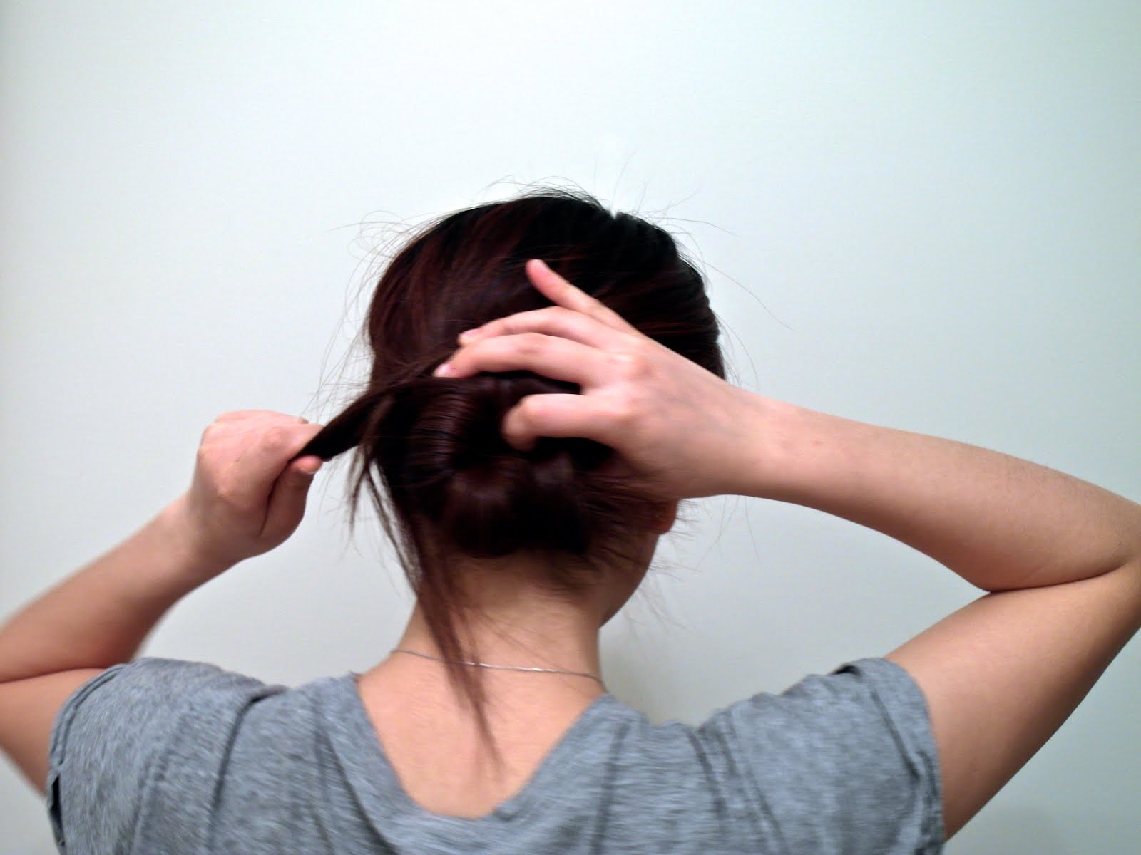 How to tie your hair with just a pen.