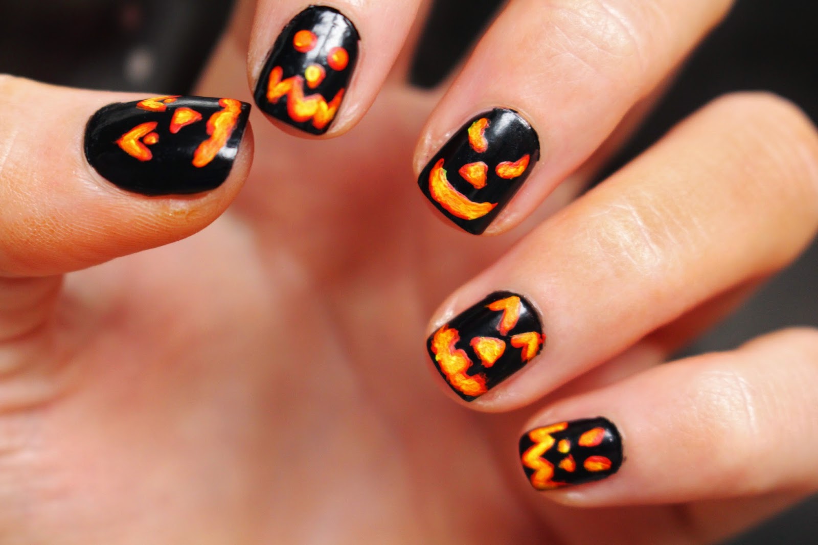 8. "Jack O Lantern Nail Design with Spider Web Accent" - wide 9