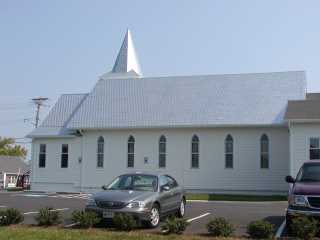Church with modern and antique metal shingles