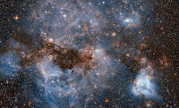 Glowing Gas and Dark Dust in the Large Magellanic Cloud Galaxy