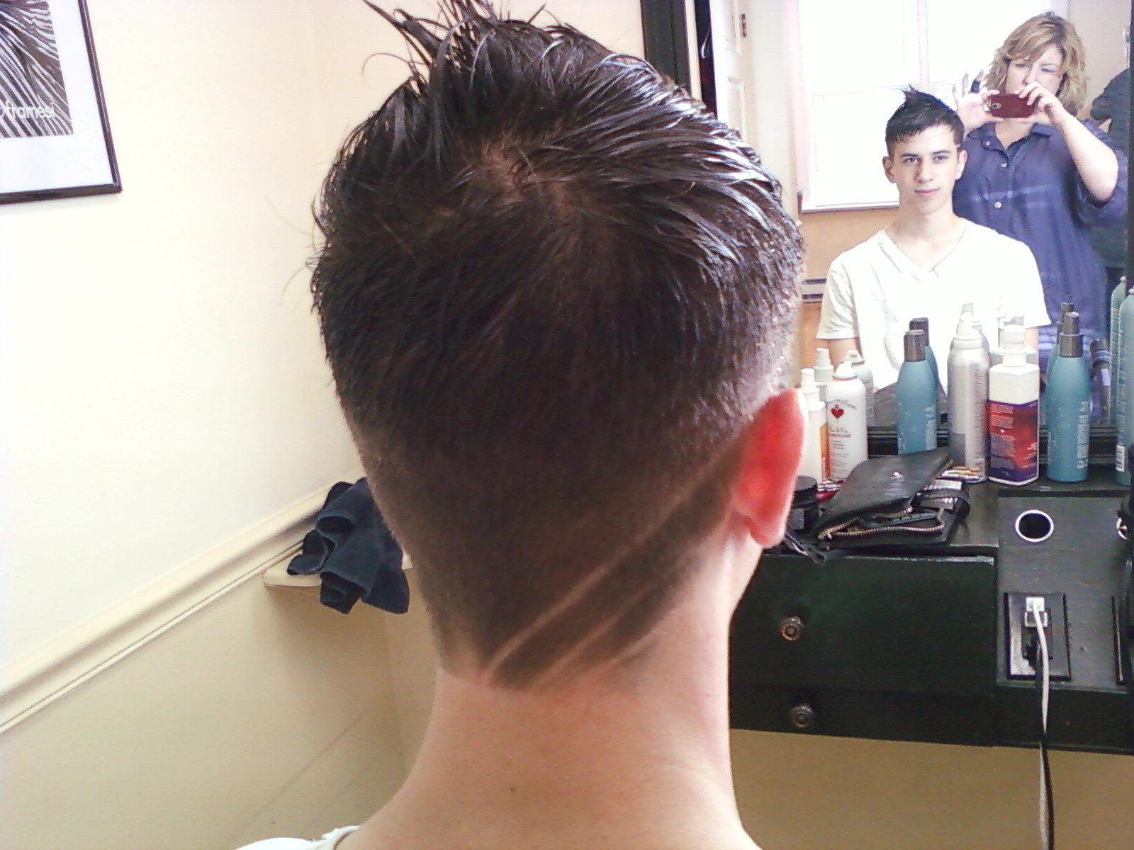 Head Hunter's Hair Affair Asymmetrical Hair Cut with Carving