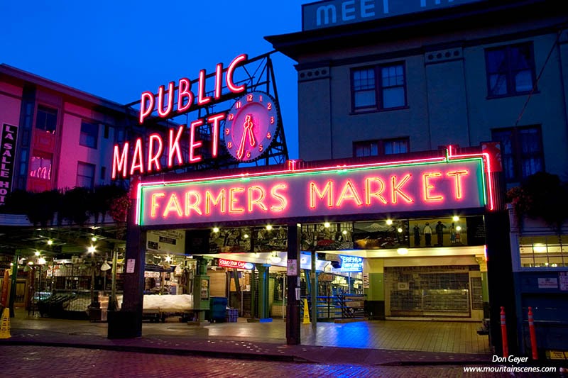 Pike Place Market in Seattle Washington lit up at night.
