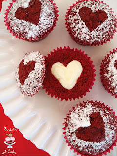 http://birdonacake.blogspot.com/2014/01/hidden-heart-red-velvet-cupcakes.html