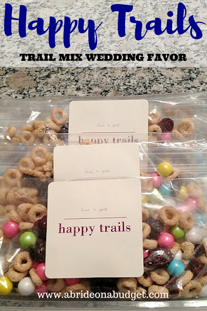 You should DEFINITELY send your wedding guests home with a late night snack ... and these Happy Trails trail mix wedding favors from www.abrideonabudget.com are PERFECT.