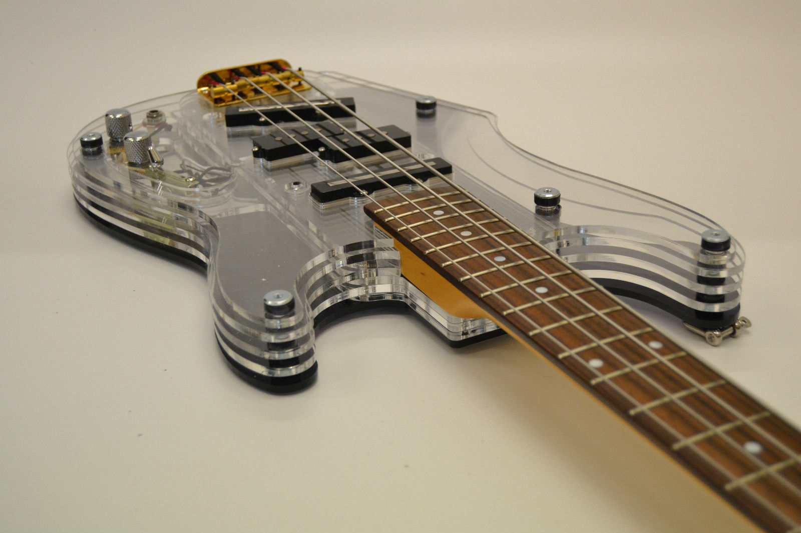 Guitar Blog Layer Guitars Acrylic bodied bass guitar