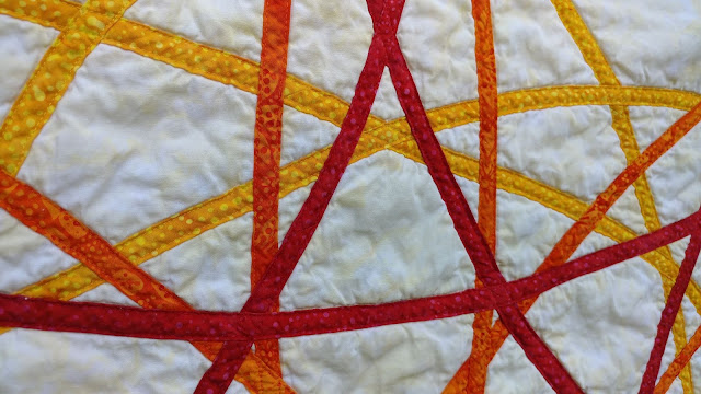 Spirograph quilt using Island Batik fabrics and Aurifil thread