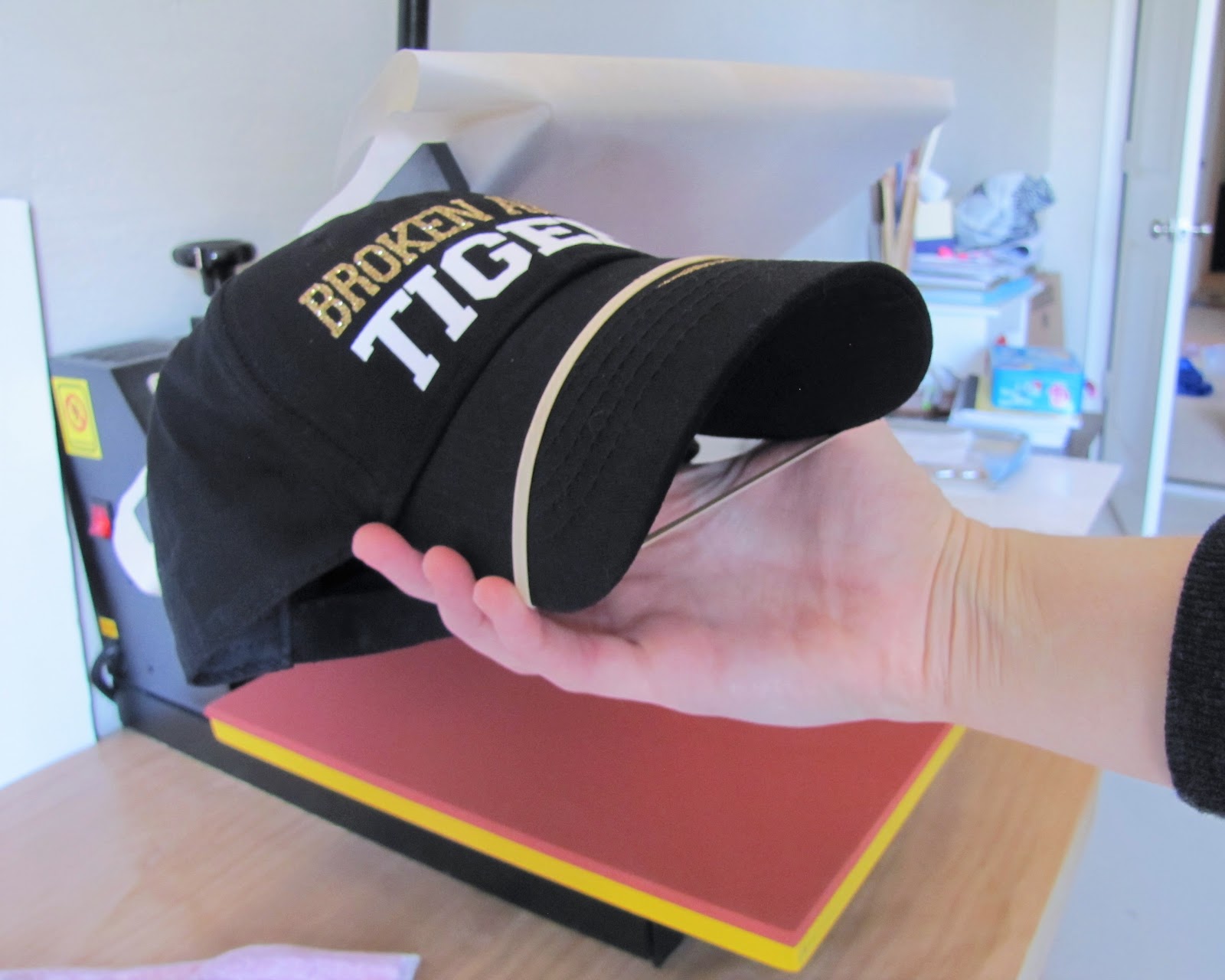 How to Heat Press a Hat: No Special Attachment Needed (Silhouette HTV  Tutorial) - Silhouette School