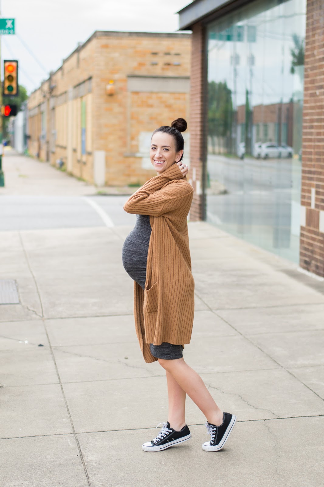 Casual Maternity Style in Bodycon dress and sneakers