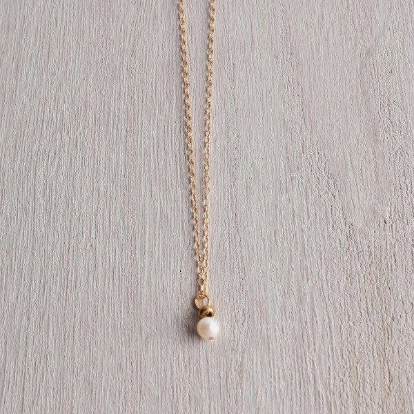 http://www.whitetrufflestudio.com/collections/new-arrivals/products/white-truffle-single-pearl-necklace