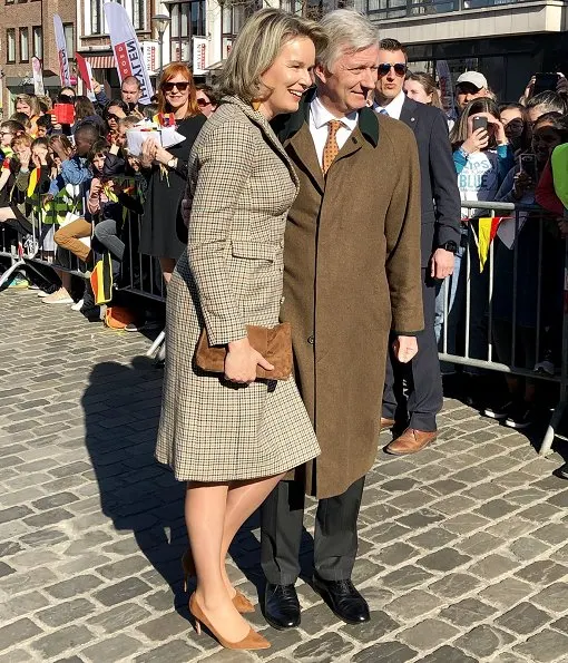 Queen Mathilde is wearing a checked coatdress from NATAN Couture Fall Winter 2017 collection. De Loods art centre in Duffel
