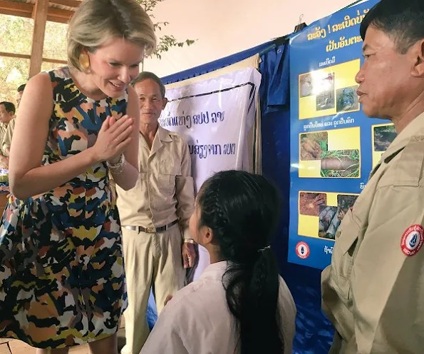 Queen Mathilde visited the Vat Phou temple south of Pakse. Queen Mathilde in a new colourfur print dress on the final day in Laos