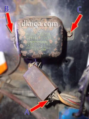 lepaskan voltage regulator yang lama