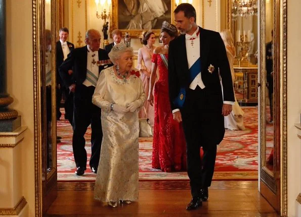 King Felipe and Queen Letizia, Prince William, Duchess Catherine of Cambridge, Prince Harry, Duchess Camilla wore Marchesa gown, Carolina herrera red dress gold diamond tiara