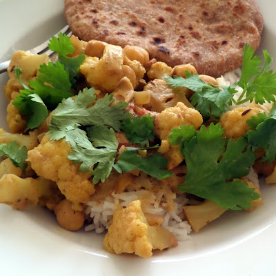 Cauliflower and Chickpea Curry:  A flavorful vegetarian curry made with cauliflower, chickpeas, and spices.