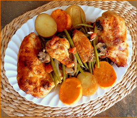 One Pot Chicken Dinner: Chicken pieces of your choice, veggies and potoes cook in one pot in the oven for an easy and flavorful dinner | Recipe developed by www.BakingInATornado.com | #recipe #dinner