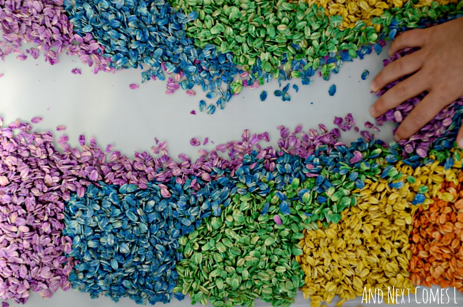 Playing with rainbow dyed oats