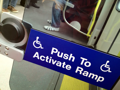 photo of push to activate ramp on LRT