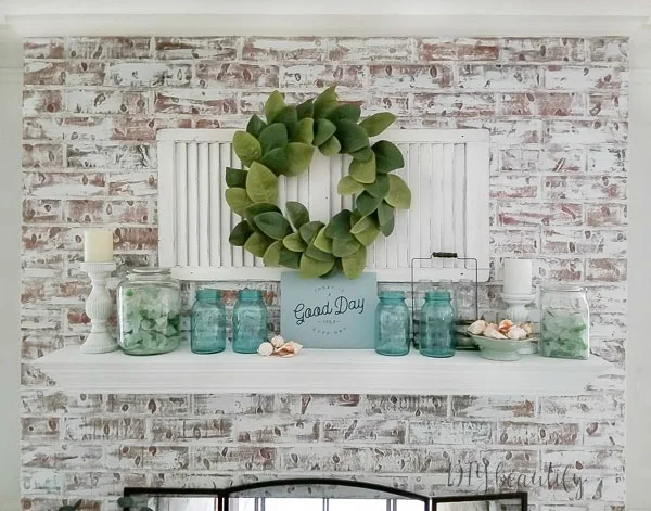 shutter, magnolia wreath, antique mason jars and beach glass