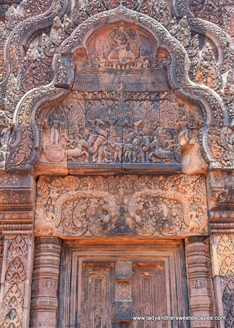 one of the many well-preserved carvings in Banteay Srei