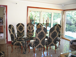 Colorful Upholstered Dining Chairs for Your Dining Room Artistic Upholstered Dining Chairs around the Glass Table and Classic Iron Candle Handles in Classic Dining Room