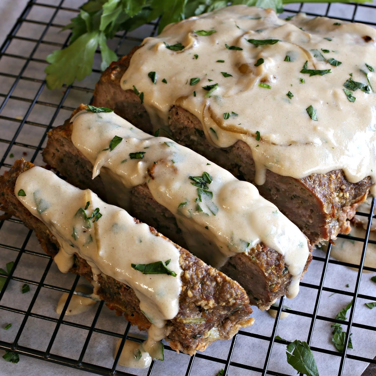 Meatloaf flavored with caramelized onions, fresh thyme and Gruyere cheese.