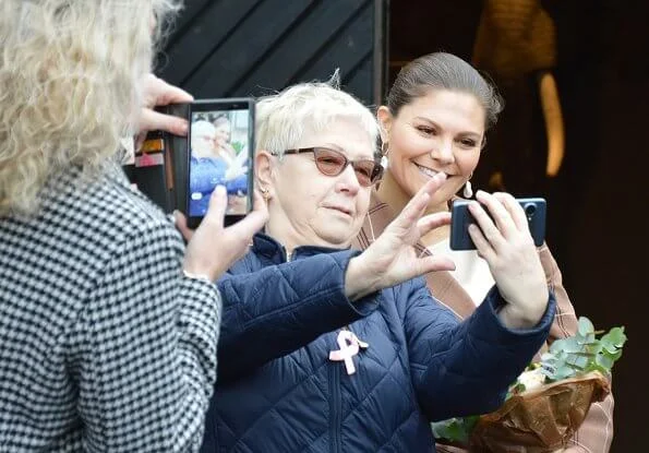 Crown Princess Victoria wore Acne Studios wool and cotton-blend suit, and Cravingfor Jewellery baroque pearl earrings