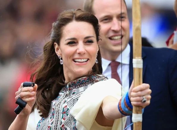 Prince William and Duchess Catherine of Cambridge tried to make a shot with the traditional bow during their Bhutan visit.