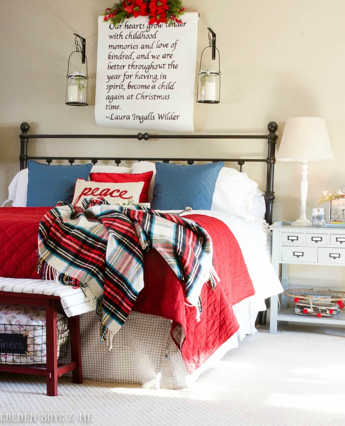 Christmas master bedroom with DIY scroll over bed made with a roll of kraft paper