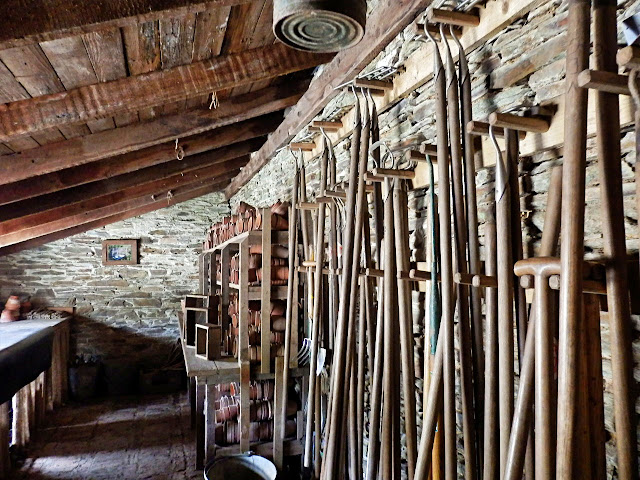 Lots of old garden tools in the Potting Shed, Heligan, Cornwall