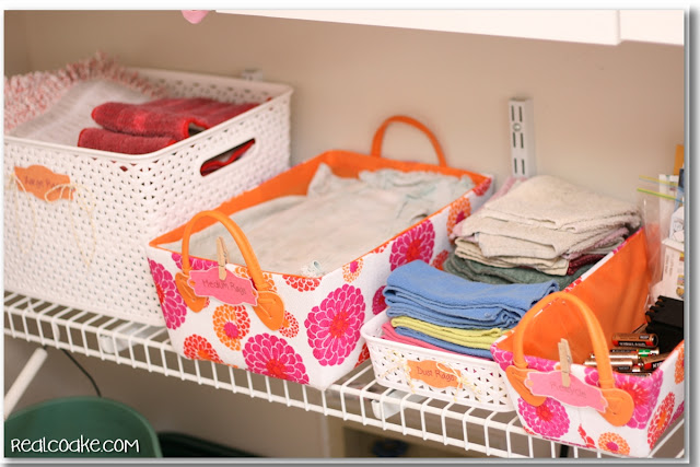 Laundry room ideas for storage and organization in a pretty and inexpensive way. #storage #organization #LaundryRoom #RealCoake