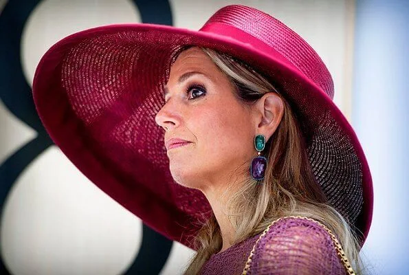 Queen Maxima's dress is by Belgian fashion house Natan