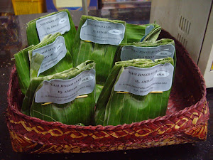NASI JENGGO--VERY POPULAR BANANA LEAVES STUFFED WITH RICE, NOODLES, MEAT, EGG, HOT SAUCE