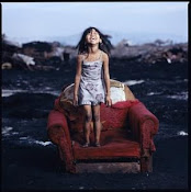 Child girl at Smokey Mountain, the main rubbish site of Manila, Philippines
