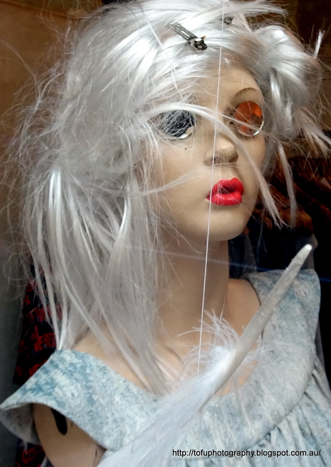 Tofu Photography A dreamy looking mannequin with wispy blonde hair in