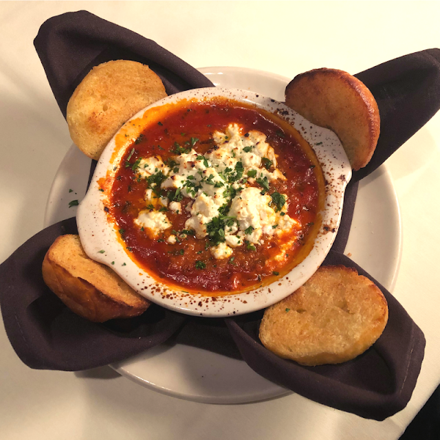 Baked Goat Cheese with house made marinara at Palm Court in Arlington Heights
