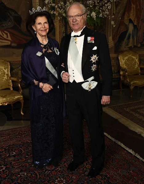 Crown Princess Victoria wore Green gown and Anya Hindmarch Gold Metallic Clutch Princess Sofia wore red gown and  silver diamond Metallic Clutch, diamond tiara.