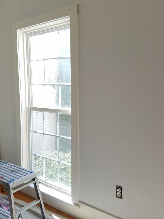 low window trimmed with 1 x 4 and 1 x 8 baseboard