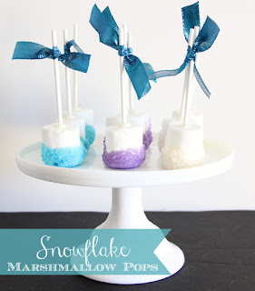 Nice Snowflake Marshmallow Pops for your Frozen Party.