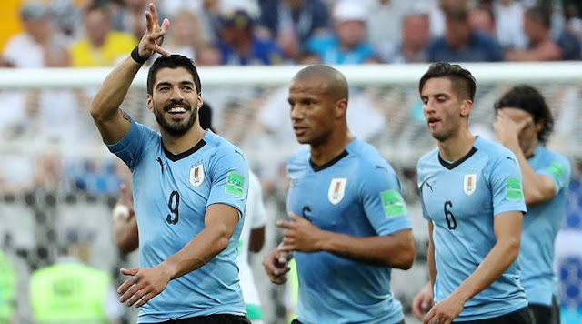 Barcelona striker Luis Suarez moved one goal behind Uruguay's record goalscorer at the World Cup, Oscar Miguez, with his seventh in total and his second in Russia this summer