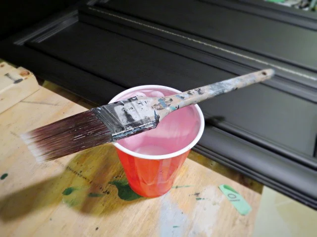 using angled brush to paint
